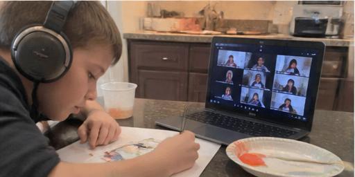 Kid attending a live online art class